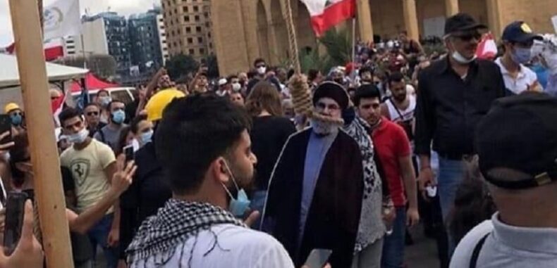 مَن كان ليتخيّل أنّكم سوف تشنقون صورة حسن نصر الله في ساحة الشهداء؟ هل تدركون مدى شجاعتكم؟